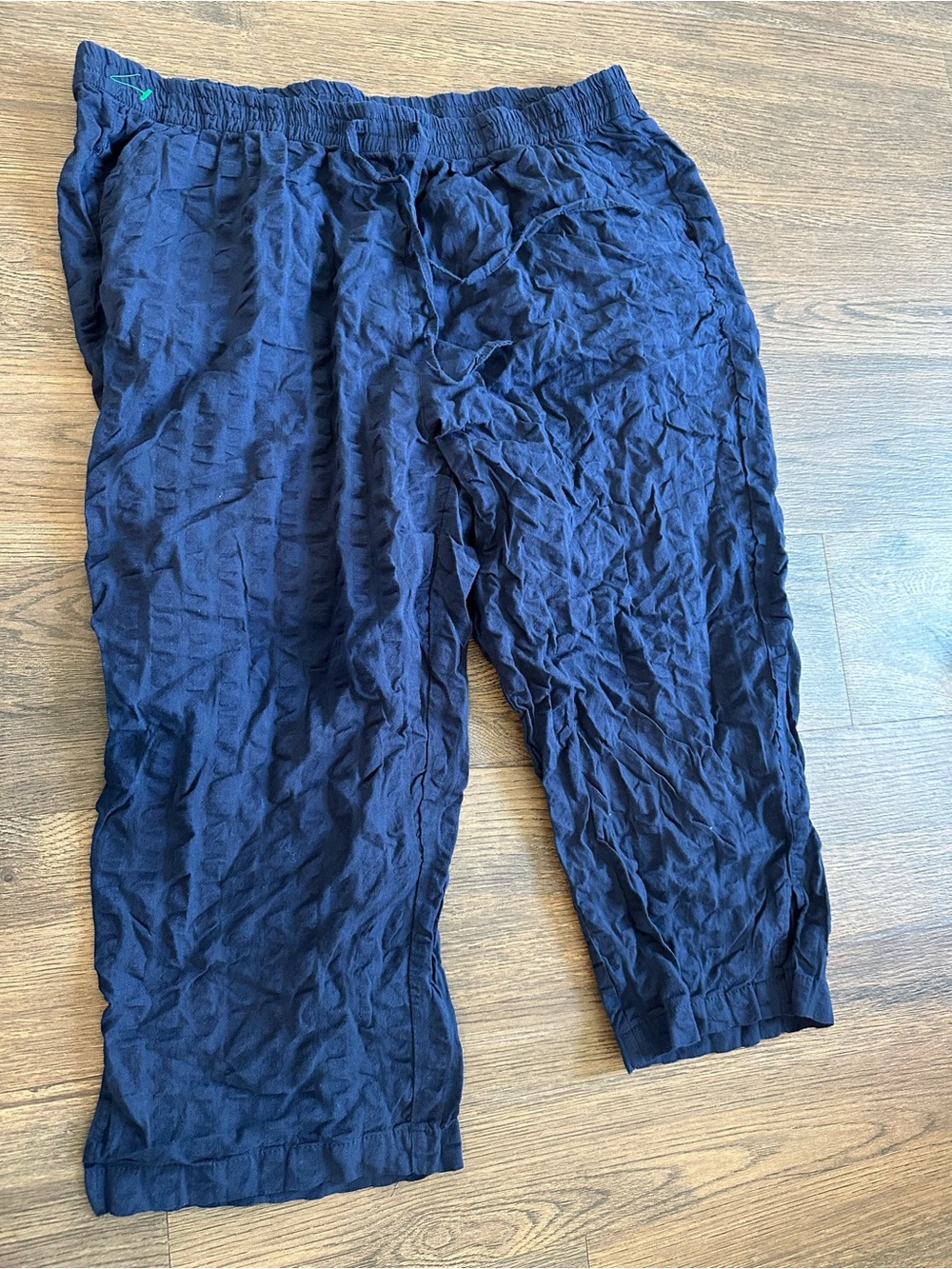 Woman within blue and black Capri bundle